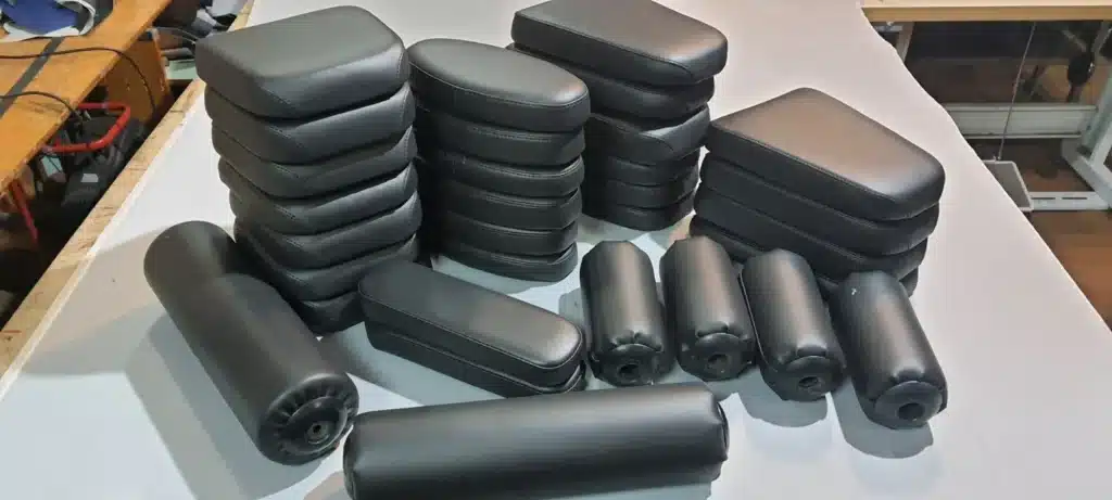 Set of newly upholstered black pads for gym machines