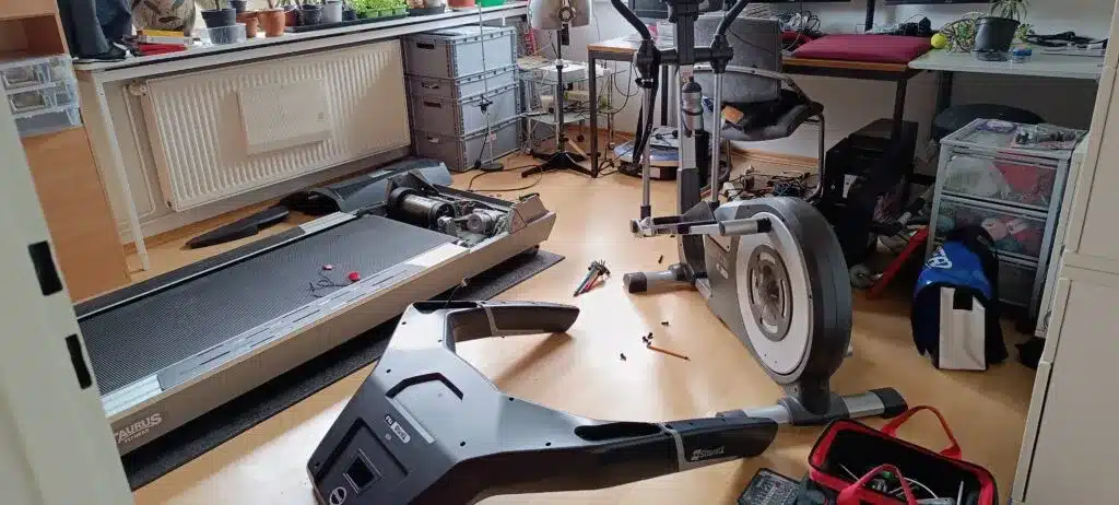 Fitness equipment parts laid out for deep cleaning and reassembly