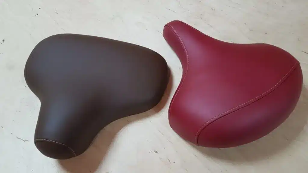 Custom-shaped gym seat cushions in red and black